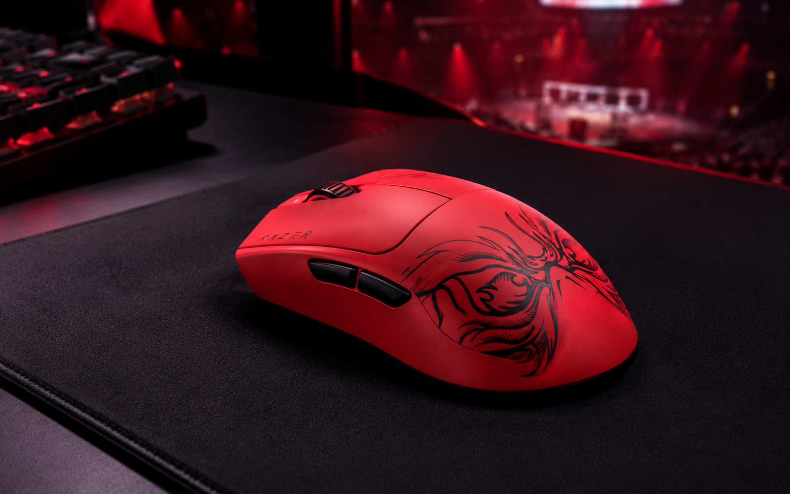 Red esports gaming mouse with black Faker Edition graphics